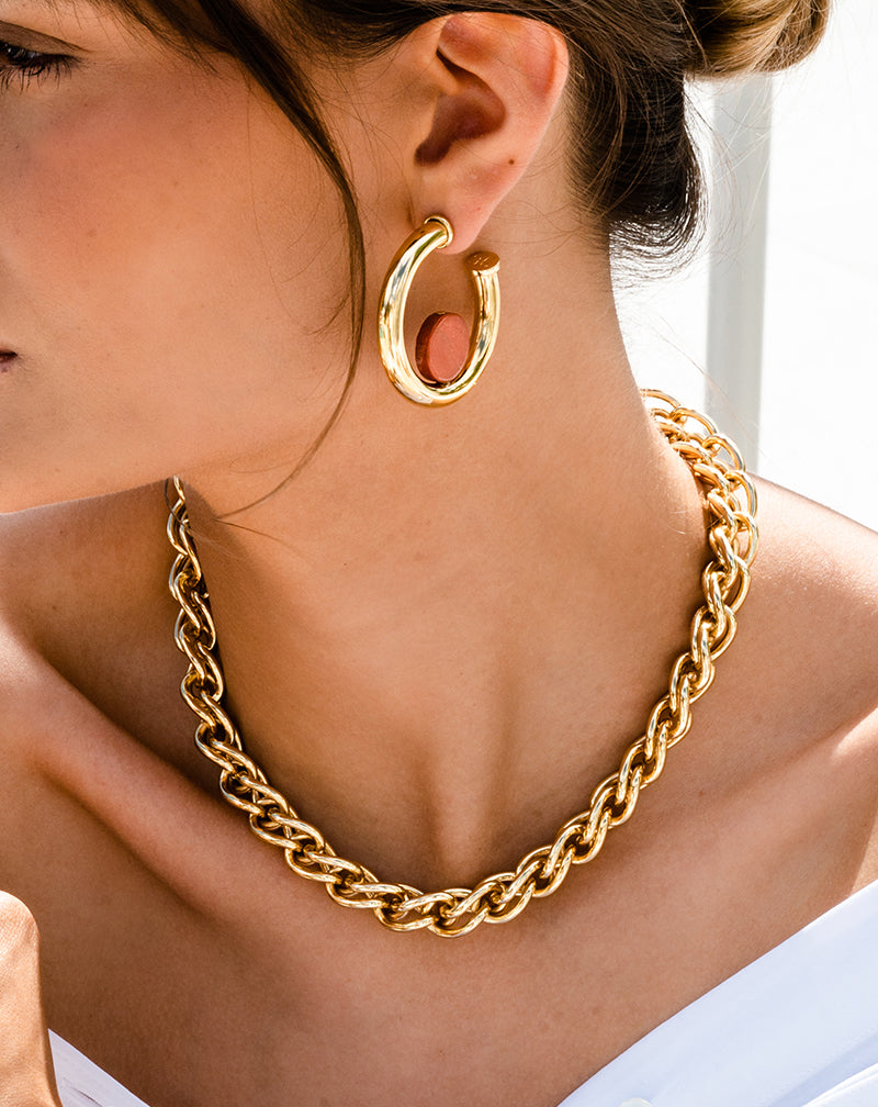 Model with white dress wearing Braided Chain Necklace