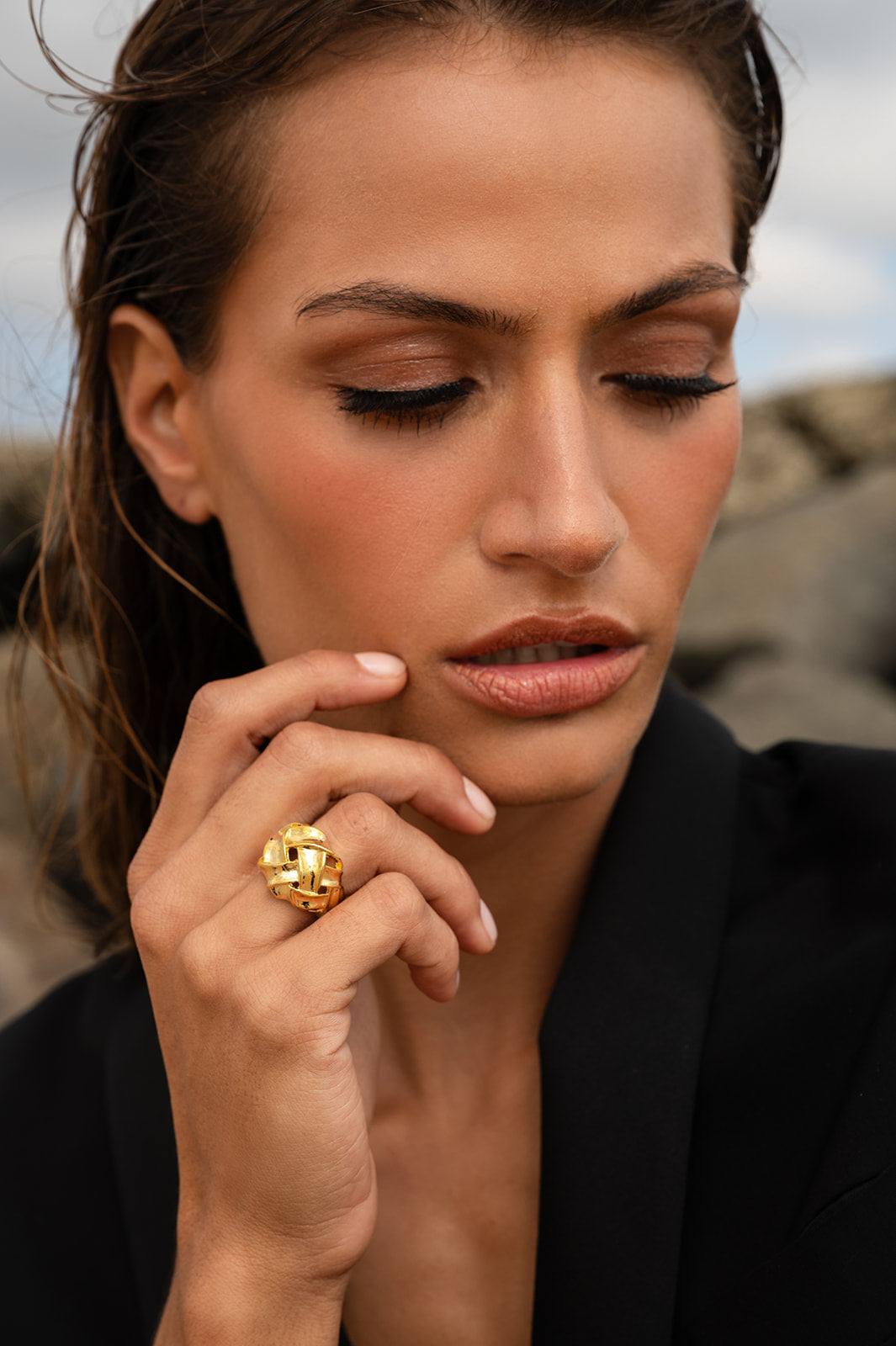 Model in black wearing Woven Ring