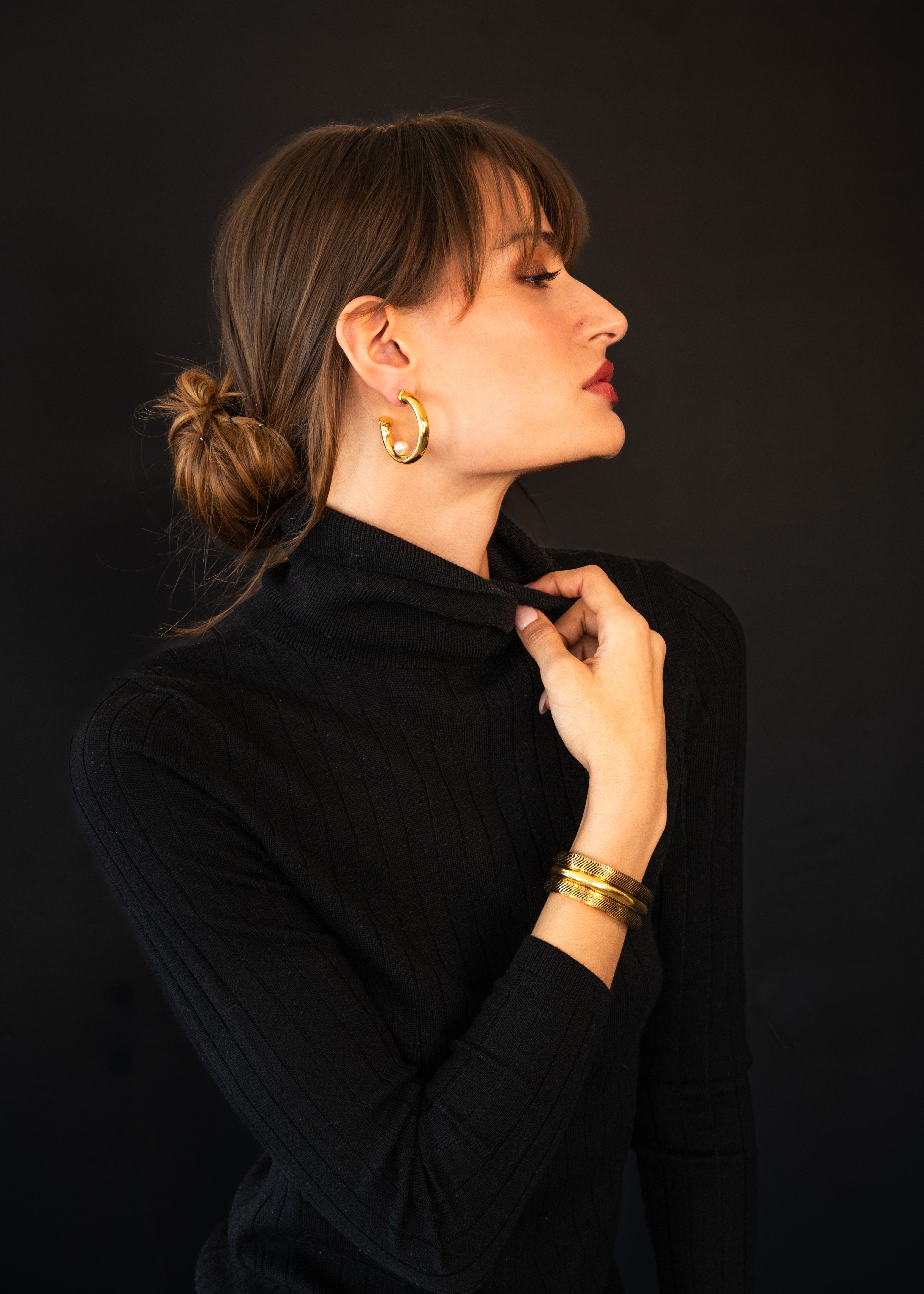 Model in black wearing Medium Hoop with Semiprecious Stone