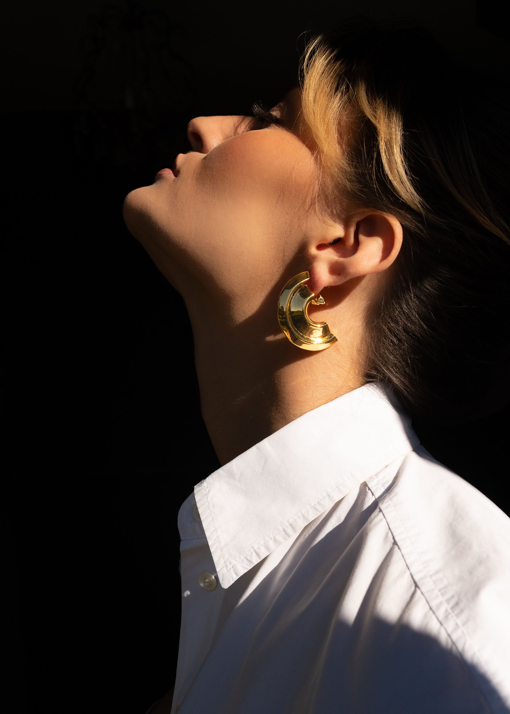 Model wearing Deco Clip on Earring