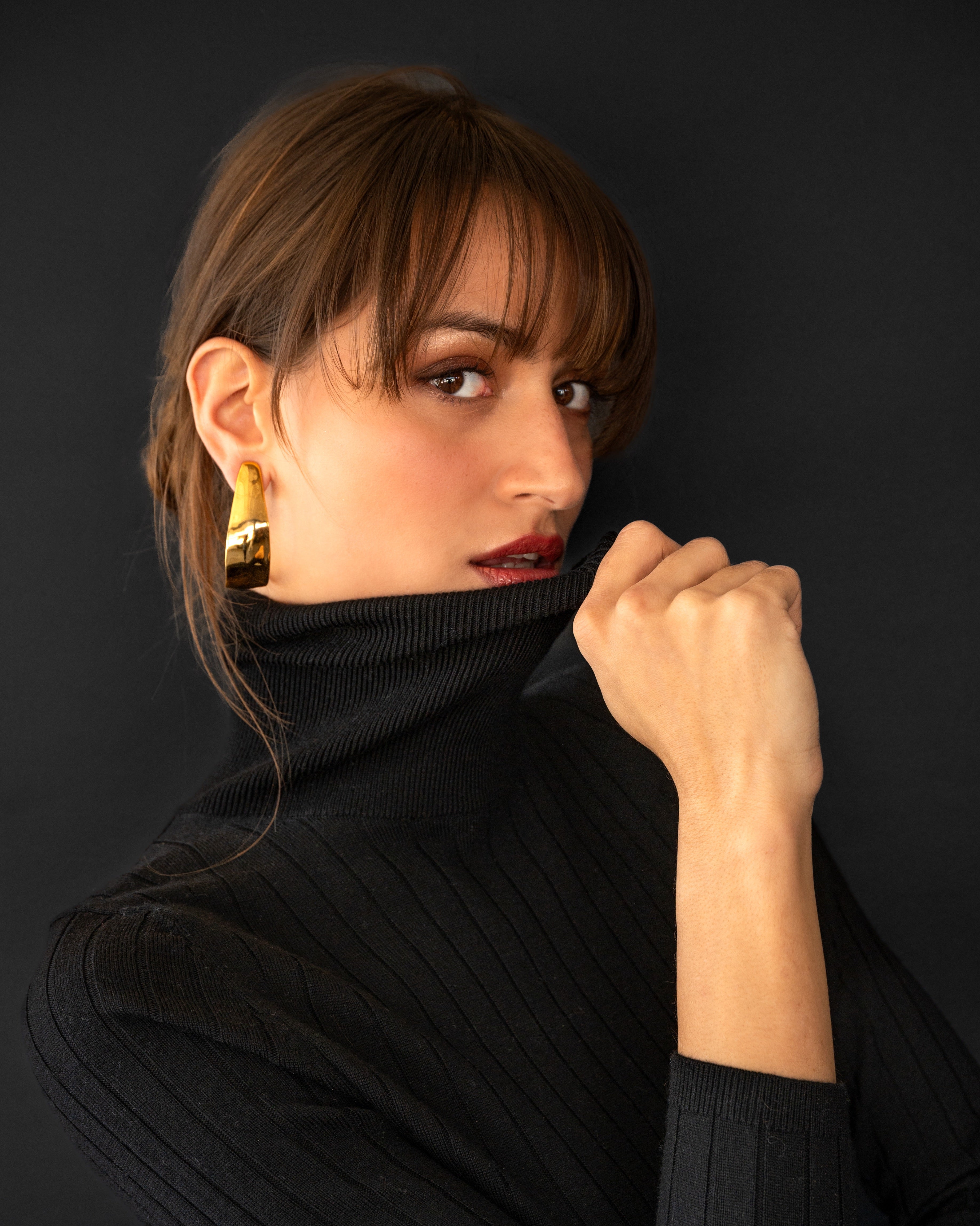 Model in black wearing Petal Earring 14k Gold Plated