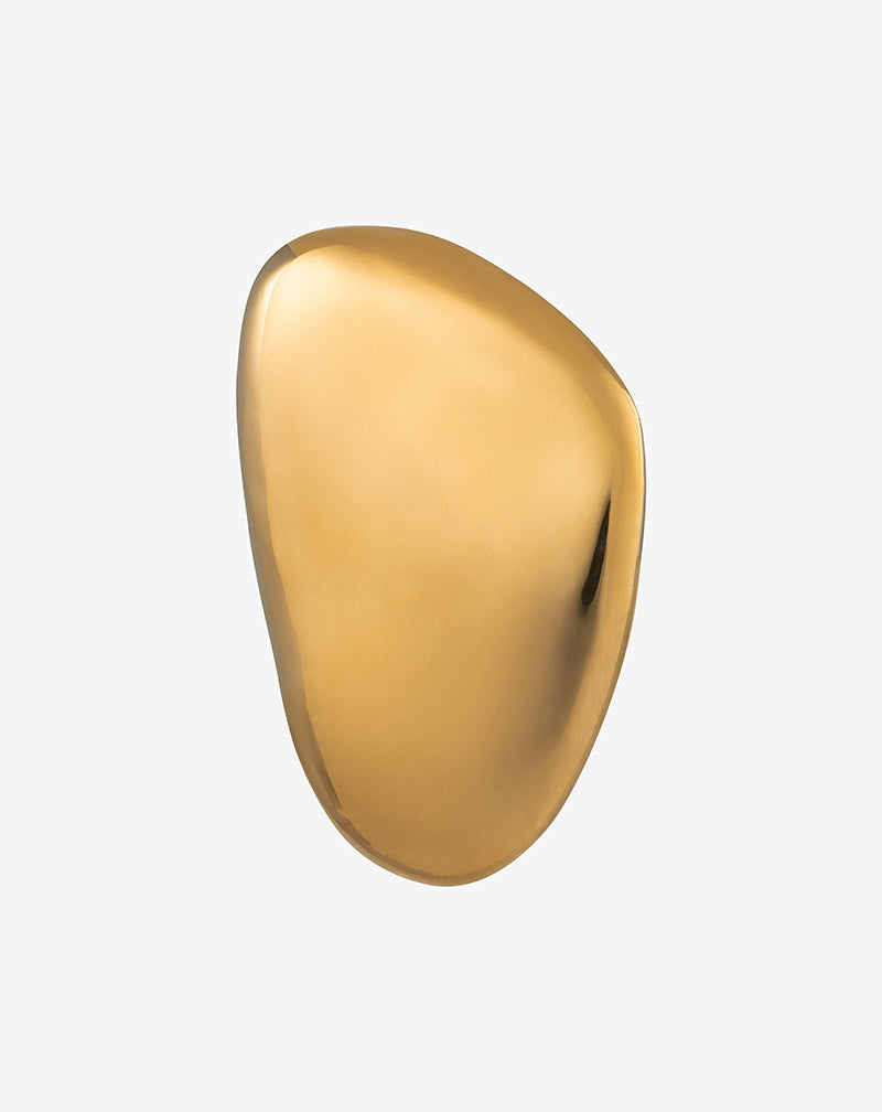 Oval Earring in gold against a white background