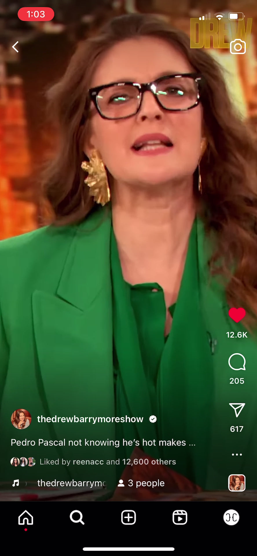 Drew Barrymore wearing a green suit and Ginkgo Leaf Earring